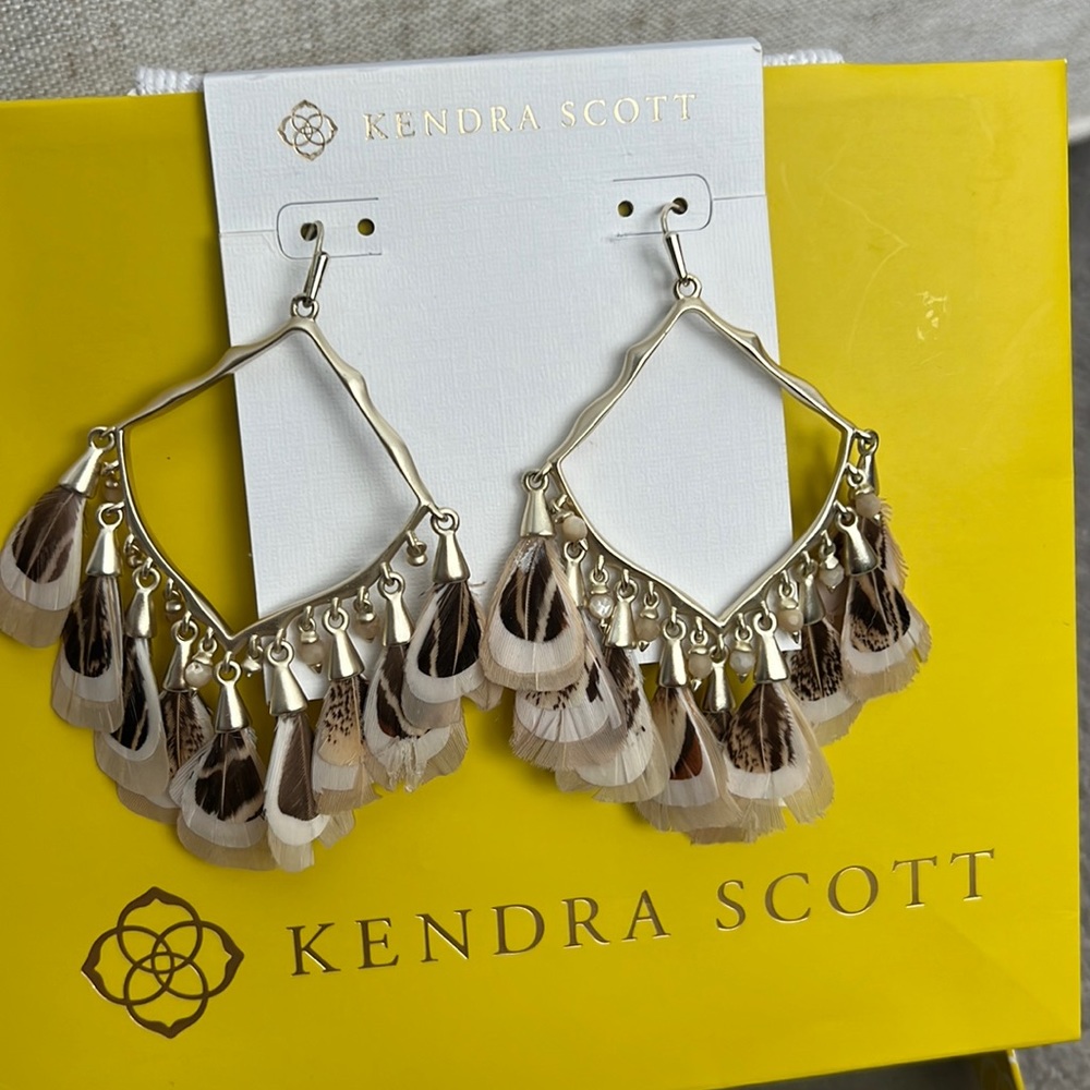 Kendra Scott earrings in gold with feathers…a show stopper